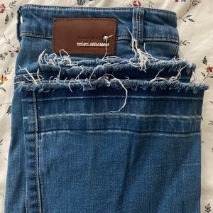 Distressed Flare Bottom Jeans